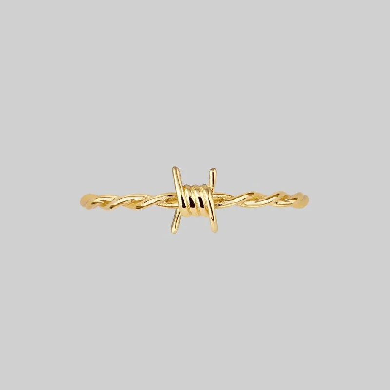 SURVIVAL. Symbolic Barbed Wire Ring - Gold